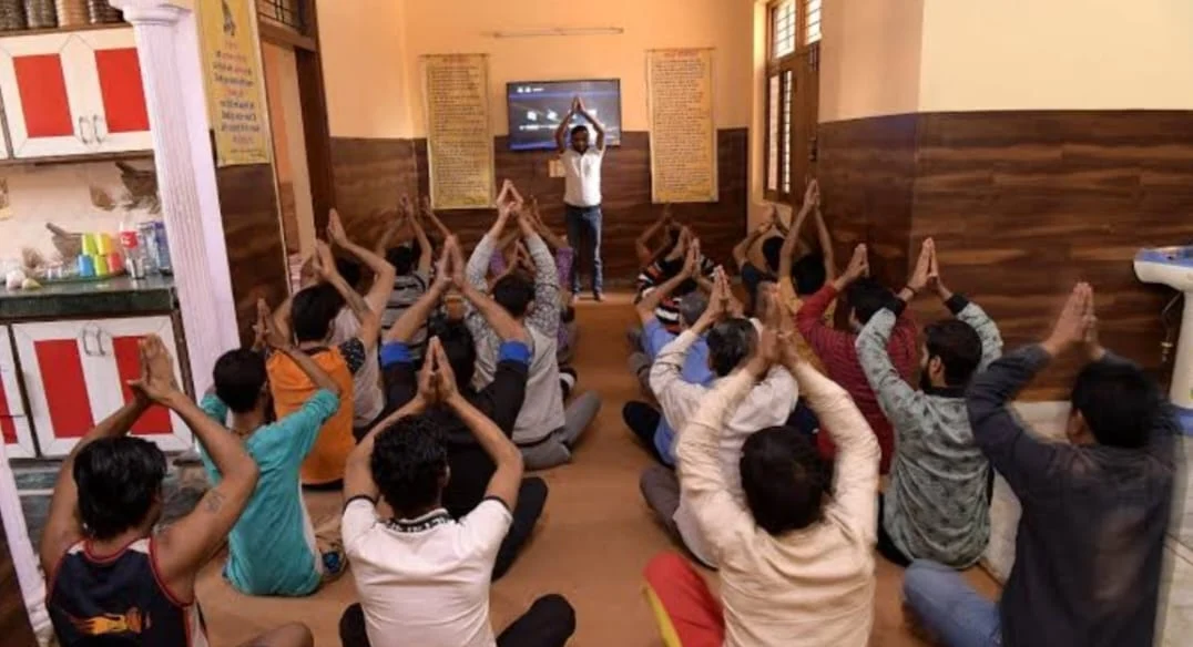 Patients participating in a daily yoga and meditation session at our rehabilitation centre